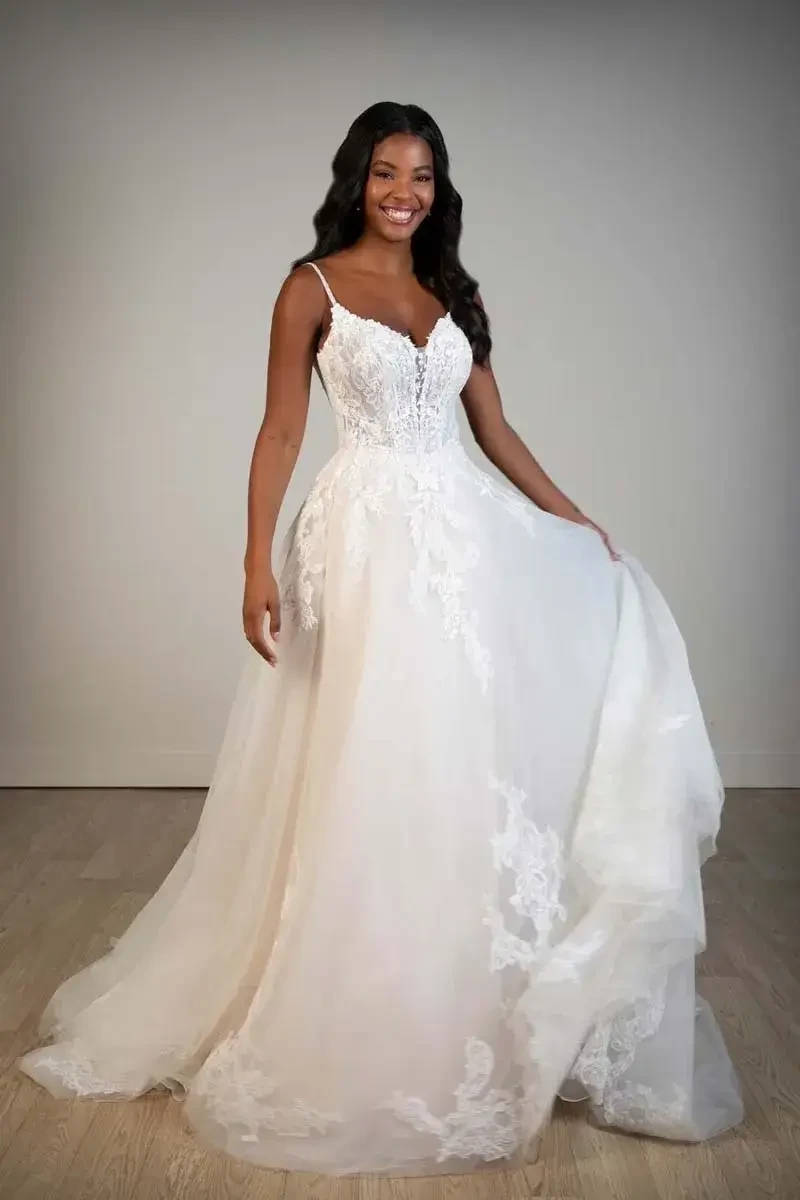 Style Meets Comfort: Selecting Your Dream Gown for a Full Day of Celebration at CLE Bride Image