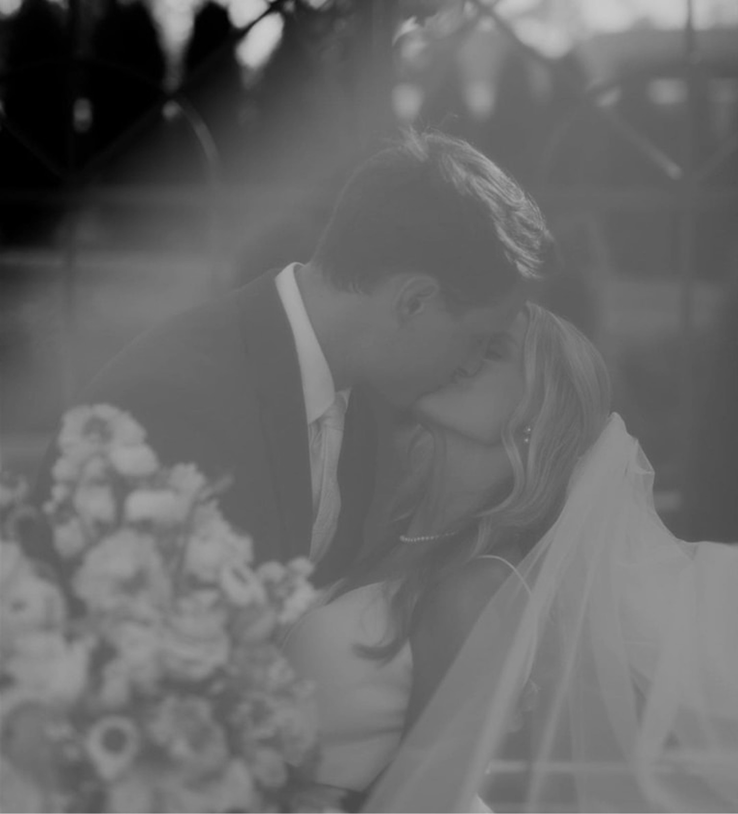 Photo of the kissing bride and groom - Mobile Image